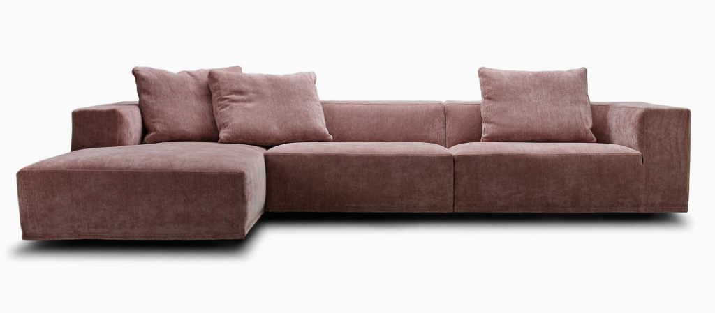 Eilersen Baseline Sofa with Chaise in rose pink, highlighting its deep seating and plush cushion configuration for modern interiors.