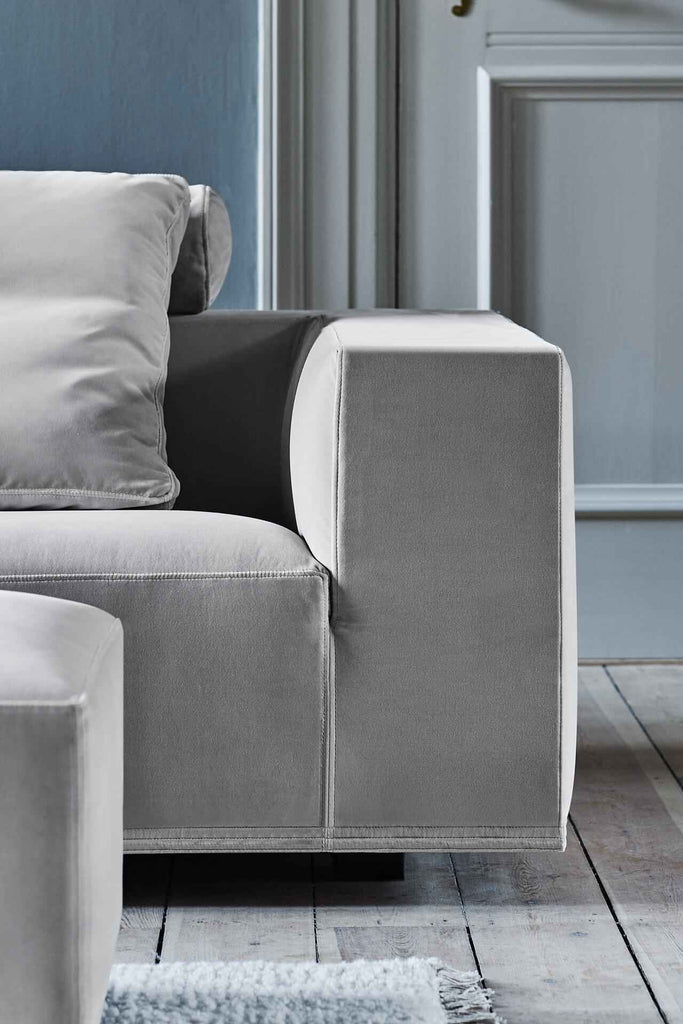Close-up of the armrest and cushion detail on the Quick Ship Baseline Sofa by Eilersen, showcasing premium upholstery and stitching.