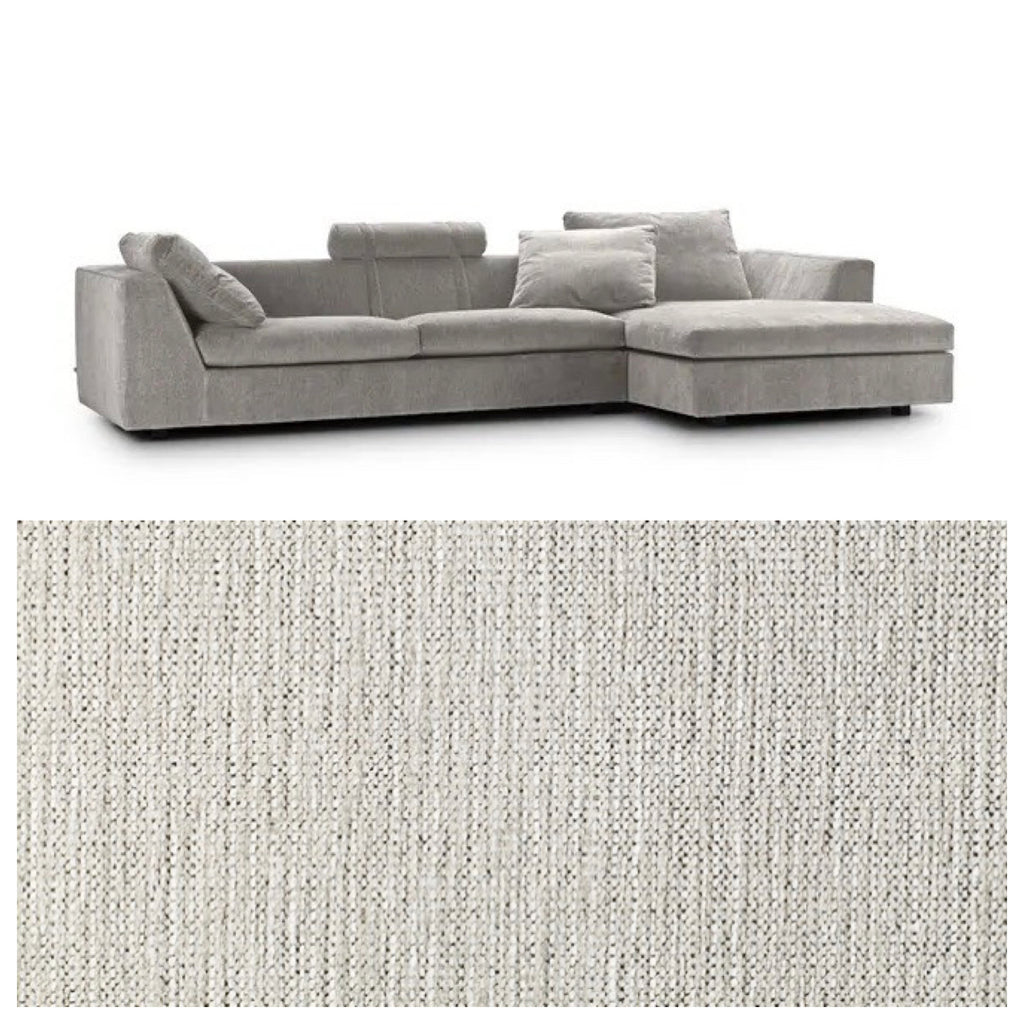 Close-up of Tangent 0037 fabric used on the Chess Sofa by Eilersen, showing its textured light grey weave ideal for modern interiors.