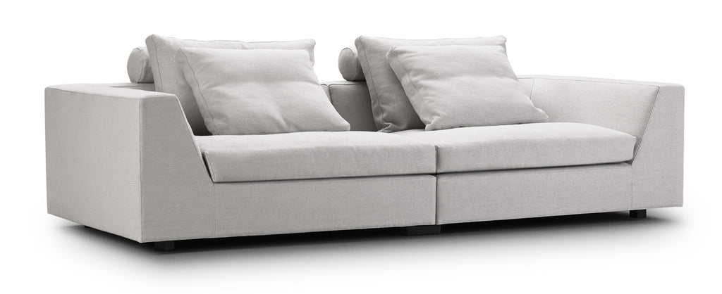 Chess Sofa by Eilersen in dark grey fabric with L-shaped configuration and plush cushions, perfect for corner seating areas.