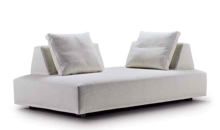 Eilersen Playground Sofa in off-white fabric with sculptural backrests, designed for modern and minimalist spaces.