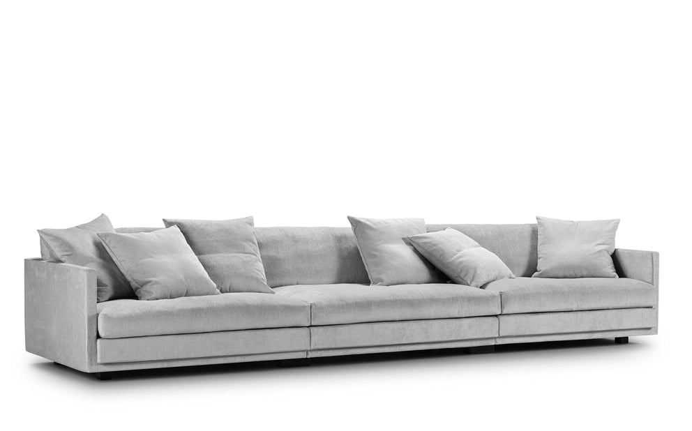 Great Ash Sofa by Eilersen in light grey fabric, displaying its modular design and minimalist aesthetic for modern living rooms.