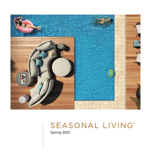 Aerial view of a stylish outdoor poolside lounge area with curved sectional sofa, side tables, and colorful pool toys, perfect for seasonal outdoor living.