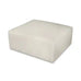 A square, low-profile ottoman or bench upholstered in a light cream or off-white fabric, shown against a plain white background.
