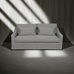 Gray sofa with two cushions in a room with light filtering through a window.