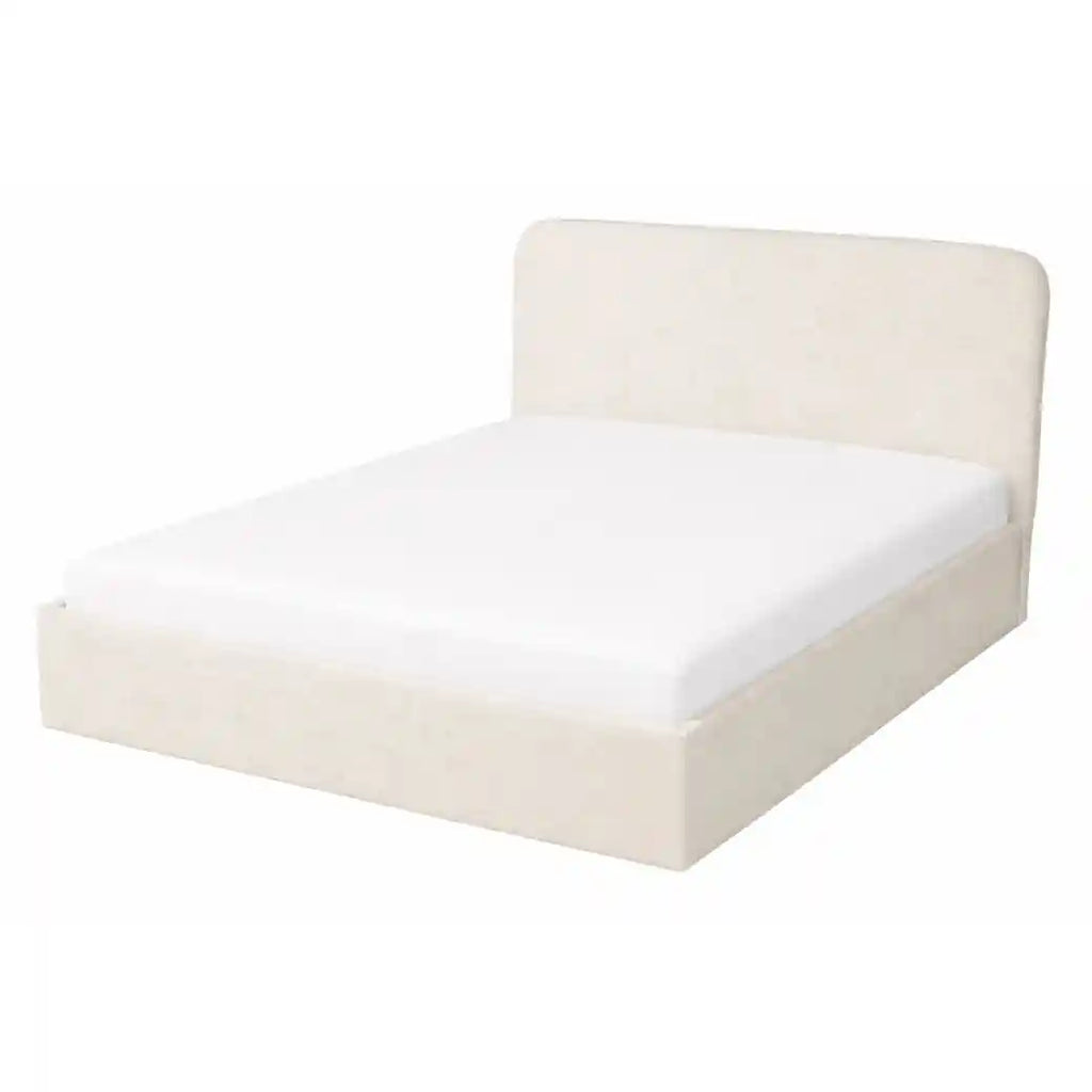 An upholstered bed frame in a light beige fabric, shown with a white mattress fitted on it, against a plain white background.