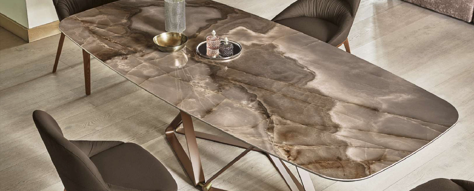 Dining table with a marble-like surface in a room setting